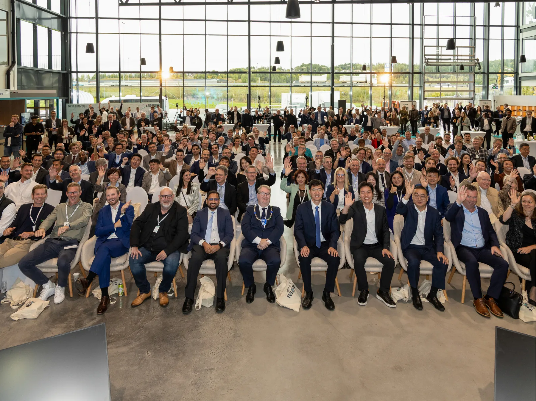Guests gathered for a group photo at the YES-EU NING Service Center opening